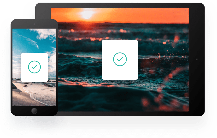 A phone and tablet with a background set and a green checkmark in the middle of a white background